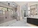 Spa-like bathroom with a walk-in shower, marble floors and modern fixtures at 5008 N Ascent Dr, Scottsdale, AZ 85251