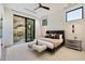 Bright bedroom with king-size bed, balcony access and modern decor at 5008 N Ascent Dr, Scottsdale, AZ 85251
