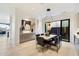 Bright dining room features a sleek table and modern light fixture at 5008 N Ascent Dr, Scottsdale, AZ 85251