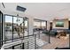 Open living area with a stunning view, fireplace and modern chandelier at 5008 N Ascent Dr, Scottsdale, AZ 85251
