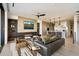 Open-concept living area with a fireplace and access to a balcony at 5008 N Ascent Dr, Scottsdale, AZ 85251