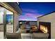 Rooftop terrace with fireplace and seating, offering city views at 5008 N Ascent Dr, Scottsdale, AZ 85251