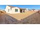 Large backyard with block wall and desert landscape at 5203 W Roundhouse Rd, Laveen, AZ 85339