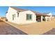 Large backyard with block wall and desert landscape at 5203 W Roundhouse Rd, Laveen, AZ 85339