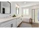Clean bathroom with a soaking tub and walk-in shower at 5203 W Roundhouse Rd, Laveen, AZ 85339