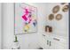 White bathroom vanity with double sinks and modern lighting at 5203 W Roundhouse Rd, Laveen, AZ 85339