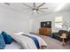 Comfortable bedroom with carpeted floor and a dresser at 5203 W Roundhouse Rd, Laveen, AZ 85339