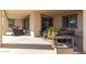 Covered patio with outdoor furniture and grill at 5203 W Roundhouse Rd, Laveen, AZ 85339