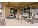 Outdoor patio with seating area and a view of backyard at 7251 E Portobello Ave, Mesa, AZ 85212