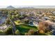 Aerial view showing house, pool, and large backyard at 8701 E Highland Ave, Scottsdale, AZ 85251