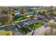 Aerial view of a home with a large backyard and neighborhood at 8701 E Highland Ave, Scottsdale, AZ 85251