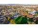 Aerial view of home with pool and large backyard, mountain views at 8701 E Highland Ave, Scottsdale, AZ 85251
