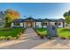 Remodeled mid-century home with modern updates, and a landscaped yard at 8701 E Highland Ave, Scottsdale, AZ 85251