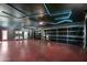 Finished garage with unique lighting and epoxy floor at 8701 E Highland Ave, Scottsdale, AZ 85251