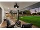 Relaxing patio area with seating and a view of the lawn at 8701 E Highland Ave, Scottsdale, AZ 85251