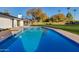 Stunning pool with spacious backyard and modern home at 8701 E Highland Ave, Scottsdale, AZ 85251