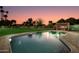 Inviting backyard oasis with a large pool and a built-in outdoor bar at 8701 E Highland Ave, Scottsdale, AZ 85251
