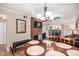 Dining area with stone fireplace and sliding glass doors to patio at 9450 E Becker Ln # 1094, Scottsdale, AZ 85260