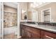 Bathroom with granite countertop and shower/tub combo at 9450 E Becker Ln # 1094, Scottsdale, AZ 85260