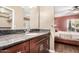Bathroom with granite countertop and double sink vanity at 9450 E Becker Ln # 1094, Scottsdale, AZ 85260