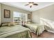 Guest bedroom with two twin beds and window at 9450 E Becker Ln # 1094, Scottsdale, AZ 85260