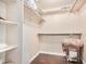 Large walk-in closet with shelving and hanging rods at 9450 E Becker Ln # 1094, Scottsdale, AZ 85260