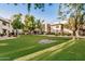 Community features a lush green lawn and landscaping at 9450 E Becker Ln # 1094, Scottsdale, AZ 85260