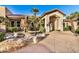 Community entrance with a fountain and well-maintained landscaping at 9450 E Becker Ln # 1094, Scottsdale, AZ 85260