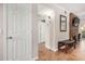 Clean condo hallway with tile flooring and storage closet at 9450 E Becker Ln # 1094, Scottsdale, AZ 85260