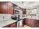 Well-equipped kitchen, featuring stainless steel appliances and granite countertops at 9450 E Becker Ln # 1094, Scottsdale, AZ 85260