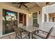Private patio with seating area and sliding door access at 9450 E Becker Ln # 1094, Scottsdale, AZ 85260