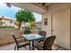 Private patio with seating area and view of the courtyard at 9450 E Becker Ln # 1094, Scottsdale, AZ 85260