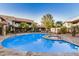 Inviting community pool with spa and lounge chairs at 9450 E Becker Ln # 1094, Scottsdale, AZ 85260