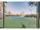 View of tennis courts from behind the fence at 9450 E Becker Ln # 1094, Scottsdale, AZ 85260