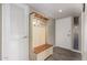Entryway with bench and storage at 9913 W Pleasant Valley Rd, Sun City, AZ 85351