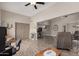 Home office with hardwood floors and built-in shelving at 9913 W Pleasant Valley Rd, Sun City, AZ 85351