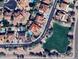 Aerial view showing home's location, pool, and proximity to green space at 26702 N 97Th Ln, Peoria, AZ 85383