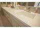 Modern bathroom vanity with double sinks and sleek countertop at 26702 N 97Th Ln, Peoria, AZ 85383