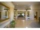 Bright and spacious entryway with high ceilings and large mirror at 26702 N 97Th Ln, Peoria, AZ 85383