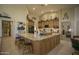 Spacious kitchen with granite countertops and large island at 26702 N 97Th Ln, Peoria, AZ 85383
