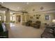 Spacious living room with high ceilings and leather seating at 26702 N 97Th Ln, Peoria, AZ 85383