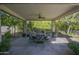 Covered patio perfect for outdoor dining and relaxation at 26702 N 97Th Ln, Peoria, AZ 85383