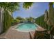 Inviting rectangular pool with surrounding patio and lounge chairs at 26702 N 97Th Ln, Peoria, AZ 85383