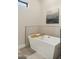 Elegant freestanding bathtub with chevron tile accent wall at 3125 N 86Th Pl, Scottsdale, AZ 85251