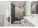 Bathroom with a walk-in shower and modern fixtures at 3125 N 86Th Pl, Scottsdale, AZ 85251