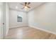 Spacious bedroom with hardwood floors and ceiling fan at 3125 N 86Th Pl, Scottsdale, AZ 85251