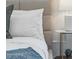 Close-up of a bedroom with a comfortable bed and nightstand at 3125 N 86Th Pl, Scottsdale, AZ 85251