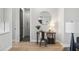 Home office with a desk, chair, and stylish decor at 3125 N 86Th Pl, Scottsdale, AZ 85251