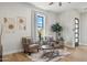 Cozy living room with comfortable seating and large windows at 3125 N 86Th Pl, Scottsdale, AZ 85251