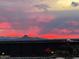 Stunning sunset view from rooftop deck with mountain silhouette at 7180 E Kierland Blvd # 916, Scottsdale, AZ 85254